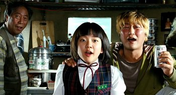 Movie still from “The Host” (2006), directed by Bong Joon Ho – A girl and a boy in a kitchen; Close Up shot, Low angle
