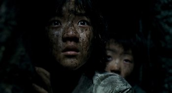 Movie still from “The Host” (2006), directed by Bong Joon Ho – A young girl with dark makeup on her face; Close Up shot, Low angle