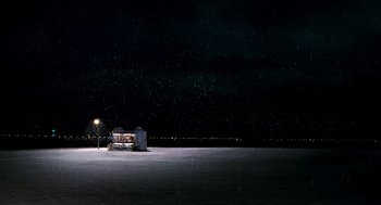 Movie still from “The Host” (2006), directed by Bong Joon Ho – A night scene of a bus stop in the middle of the night; Extreme Wide shot, High angle