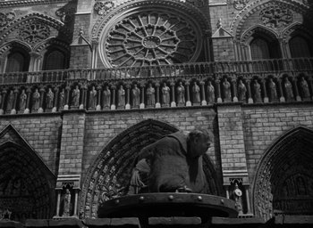 Movie still from “The Hunchback of Notre Dame” (1939), directed by William Dieterle – An elephant statue in front of a cathedral; Wide shot, Low angle