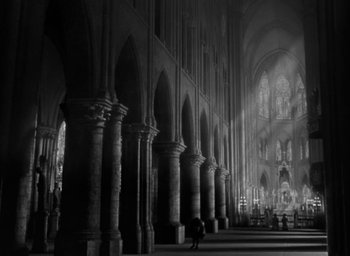 Movie still from “The Hunchback of Notre Dame” (1939), directed by William Dieterle – A black - and - white photo of an old cathedral; Extreme Wide shot, High angle