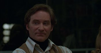 Movie still from “The Ice Storm” (1997), directed by Ang Lee – A person wearing a shirt; Close Up shot, Low angle