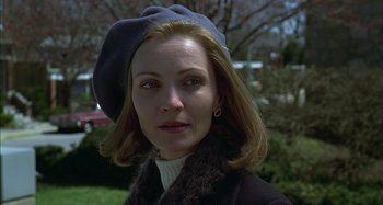 Movie still from “The Ice Storm” (1997), directed by Ang Lee – A person wearing a hat; Close Up shot, Over the shoulder angle