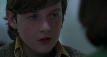Movie still from “The Ice Storm” (1997), directed by Ang Lee – A young boy's face; Close Up shot, Over the shoulder angle