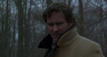 Movie still from “The Ice Storm” (1997), directed by Ang Lee – A person wearing a coat; Close Up shot, Low angle