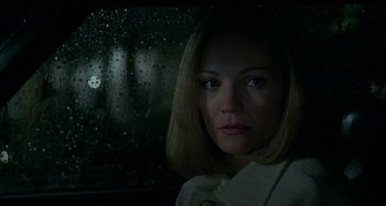 Movie still from “The Ice Storm” (1997), directed by Ang Lee – A person in a car window; Close Up shot, Low angle