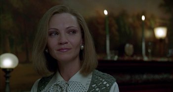 Movie still from “The Ice Storm” (1997), directed by Ang Lee – A person wearing a dress; Close Up shot, Over the shoulder angle