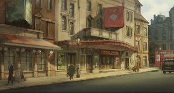Movie still from “The Illusionist” (2010), directed by Sylvain Chomet – An illustration of an old movie theater with a man walking down the sidewalk; Extreme Wide shot, Low angle