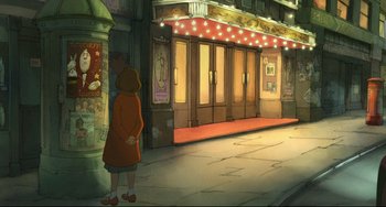 Movie still from “The Illusionist” (2010), directed by Sylvain Chomet – A woman standing in front of a theater at night; Extreme Wide shot, High angle