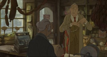 Movie still from “The Illusionist” (2010), directed by Sylvain Chomet – An animated scene of a man talking to an older man; Medium shot, High angle