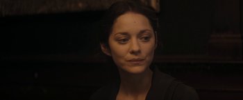 Movie still from “The Immigrant” (2013), directed by James Gray – A person wearing a black shirt; Close Up shot, Over the shoulder angle
