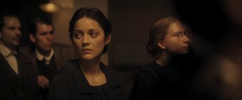 Movie still from “The Immigrant” (2013), directed by James Gray – Two women standing next to each other in front of a wall; Close Up shot, Over the shoulder angle
