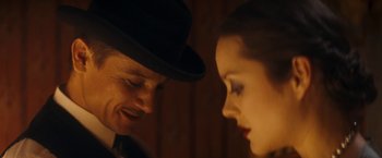 Movie still from “The Immigrant” (2013), directed by James Gray – A man and a woman looking at one another; Close Up shot, Over the shoulder angle