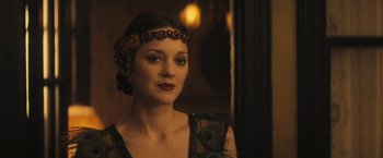 Movie still from “The Immigrant” (2013), directed by James Gray – A woman wearing a headpiece in front of a mirror; Close Up shot, Over the shoulder angle