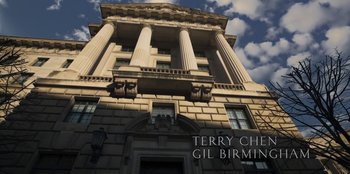 A tall building with pillars on the top of it