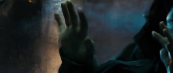 Movie still from “The Imposter” (2012), directed by Bart Layton – A blurry image of a person's hand in the dark; Extreme Close Up shot, Low angle