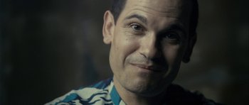 Movie still from “The Imposter” (2012), directed by Bart Layton – A man's face in a room; Close Up shot, Over the shoulder angle
