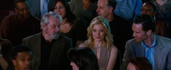 Movie still from “The Incredible Burt Wonderstone” (2013), directed by Don Scardino – A group of people sitting in a room; Medium shot, Over the shoulder angle