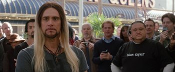 Movie still from “The Incredible Burt Wonderstone” (2013), directed by Don Scardino – A group of people standing in front of a building; Close Up shot, Over the shoulder angle