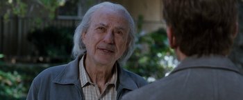 Movie still from “The Incredible Burt Wonderstone” (2013), directed by Don Scardino – An older man is talking to a younger man outside; Close Up shot, Over the shoulder angle