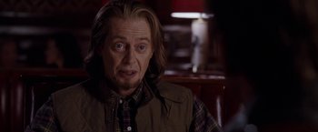 Movie still from “The Incredible Burt Wonderstone” (2013), directed by Don Scardino – A person sitting in a chair; Close Up shot, Over the shoulder angle