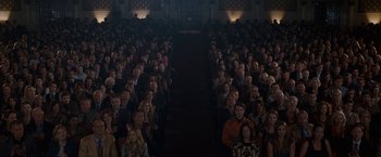 Movie still from “The Incredible Burt Wonderstone” (2013), directed by Don Scardino – A large group of people sitting in a room; Wide shot, High angle