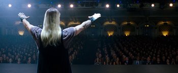 Movie still from “The Incredible Burt Wonderstone” (2013), directed by Don Scardino – A person is standing in front of an audience; Wide shot, High angle