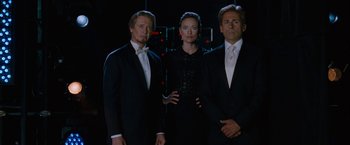 Movie still from “The Incredible Burt Wonderstone” (2013), directed by Don Scardino – A group of three people standing next to each other in a dark room; Medium shot, Low angle