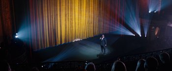 Movie still from “The Incredible Burt Wonderstone” (2013), directed by Don Scardino – A man standing on a stage in front of an audience; Extreme Wide shot, High angle