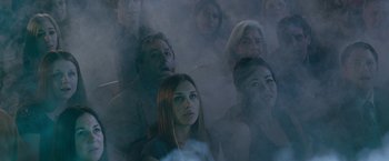 Movie still from “The Incredible Burt Wonderstone” (2013), directed by Don Scardino – A group of people sitting in the middle of a room; Medium shot, High angle