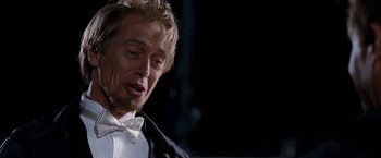 Movie still from “The Incredible Burt Wonderstone” (2013), directed by Don Scardino – A person wearing a suit and bow tie; Close Up shot, Over the shoulder angle