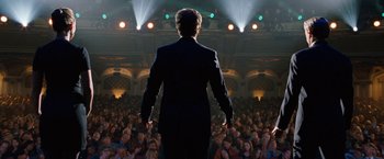 Movie still from “The Incredible Burt Wonderstone” (2013), directed by Don Scardino – A man standing in front of a crowd of people in front of an audience; Wide shot, Low angle
