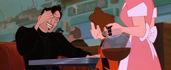 Movie still from “The Iron Giant” (1999), directed by Brad Bird – An animated picture of a man and a woman in front of a table; Close Up shot, Over the shoulder angle