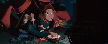 Movie still from “The Iron Giant” (1999), directed by Brad Bird – A cartoon of a boy holding a toy gun and a bowl of cereal; Medium shot, High angle
