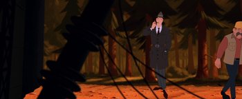 Movie still from “The Iron Giant” (1999), directed by Brad Bird – An animated man is talking on a cell phone; Medium shot, Low angle