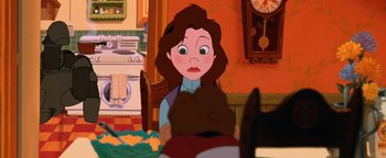 Movie still from “The Iron Giant” (1999), directed by Brad Bird – A woman sitting in front of an oven in front of a clock; Close Up shot, Over the shoulder angle