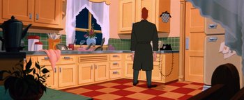 Movie still from “The Iron Giant” (1999), directed by Brad Bird – A man standing in front of a kitchen sink; Wide shot, High angle