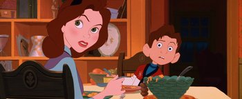Movie still from “The Iron Giant” (1999), directed by Brad Bird – A woman sitting at a dinner table with a boy; Close Up shot, Over the shoulder angle