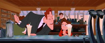 Movie still from “The Iron Giant” (1999), directed by Brad Bird – A man and a boy sitting at a table with a milkshake; Medium shot, Over the shoulder angle