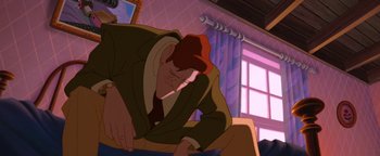 Movie still from “The Iron Giant” (1999), directed by Brad Bird – A man in a brown suit and a red hat is looking down; Medium shot, Low angle