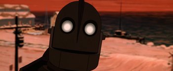 Movie still from “The Iron Giant” (1999), directed by Brad Bird – The head of an iron man character; Close Up shot, Low angle