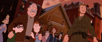 Movie still from “The Iron Giant” (1999), directed by Brad Bird – A group of people standing in front of a house; Medium shot, Low angle