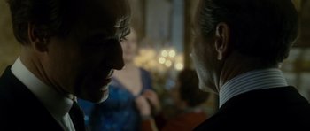 Movie still from “The Iron Lady” (2011), directed by Phyllida Lloyd – Two people are talking to each other in a room; Close Up shot, Over the shoulder angle