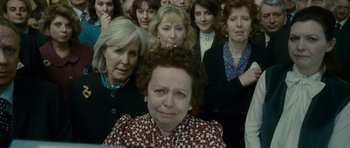 Movie still from “The Iron Lady” (2011), directed by Phyllida Lloyd – A group of women standing in a room; Close Up shot, High angle