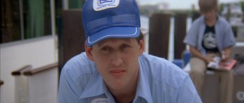 Movie still from “The Island” (1980), directed by Michael Ritchie – A person wearing a hat; Close Up shot, Low angle