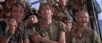 Movie still from “The Island” (1980), directed by Michael Ritchie – A group of men standing next to each other on top of a boat; Close Up shot, Low angle