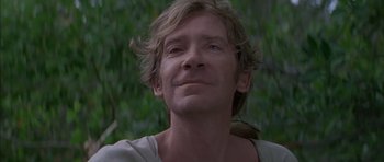 Movie still from “The Island” (1980), directed by Michael Ritchie – A person with long hair; Close Up shot, Low angle