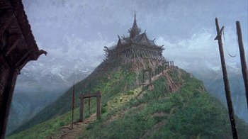 Movie still from “The Island at the Top of the World” (1974), directed by Robert Stevenson – An oil painting of a mountain with a castle on top of it; Extreme Wide shot, Low angle