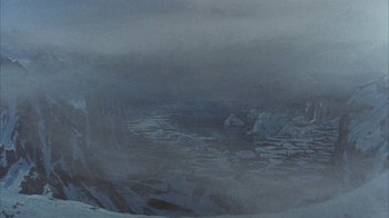 Movie still from “The Island at the Top of the World” (1974), directed by Robert Stevenson – An oil painting of a frozen lake in the middle of the day; Extreme Wide shot, High angle