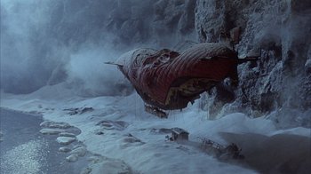Movie still from “The Island at the Top of the World” (1974), directed by Robert Stevenson – An image of an alien creature in the snow; Extreme Wide shot, High angle